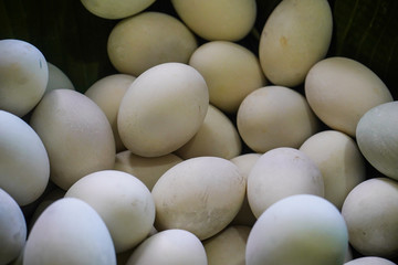 background of fresh eggs for sale at a market. Group of organic free range chicken eggs