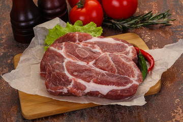 Raw pork neck steak