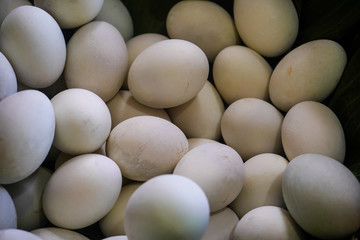 background of fresh eggs for sale at a market. Group of organic free range chicken eggs
