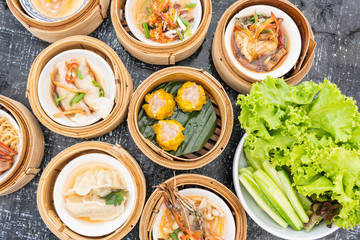 Various thai Dim Sam on the table in morning light