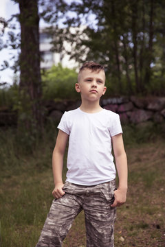 Young photo model posing, boy fashion portrait