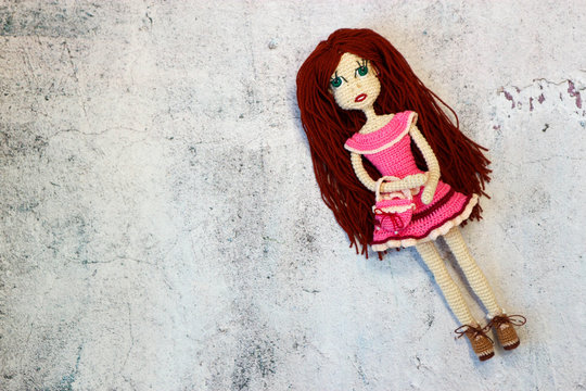 knitted crochette doll in red dress with bag