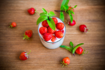sweet homemade yogurt with fresh ripe strawberries