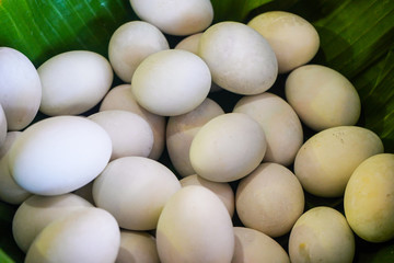 background of fresh eggs for sale at a market. Group of organic free range chicken eggs