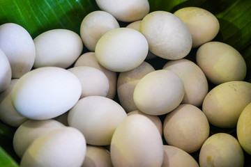 background of fresh eggs for sale at a market. Group of organic free range chicken eggs