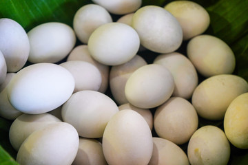 background of fresh eggs for sale at a market. Group of organic free range chicken eggs