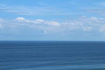 Fototapeta premium sea, sky, ocean, water, blue, horizon, clouds, cloud, nature, summer, landscape, wave, beach, calm, sun, seascape, cloudy, beautiful, travel, view, day, waves, color, white, cloudscape