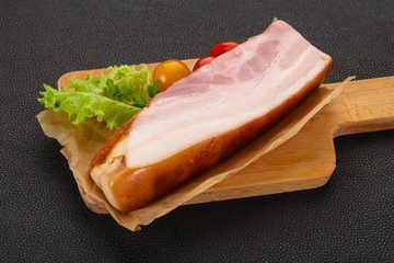 Smoked pork breast with salad leaves