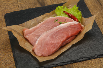 Juicy raw pork steak meat
