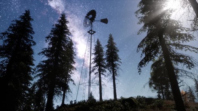 retro windmill in mountain forest with stars. hyperlapse