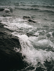waves crashing on rocks
