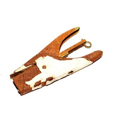 A rusty metal oxidation on a vintage tool join a film in a developer processing.