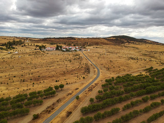 Aerial view of a agricultural field with a small village in Portugal