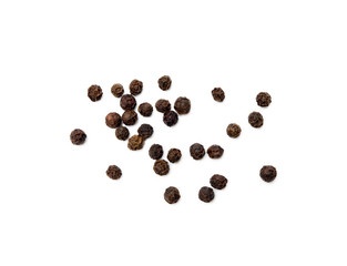 Scattered pepper isolated on white background