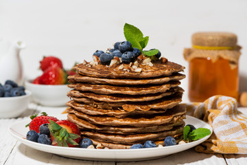 stack of homemade pancakes for breakfast, closeup