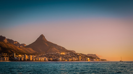 Cape Town, South Africa with Table Top Mountain and Lions Head at Sunset