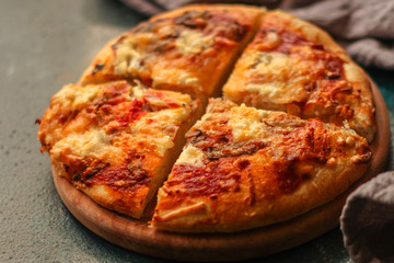 pizza with different types of cheese (tomato sauce and other ingredients, snack). top food background. copy space