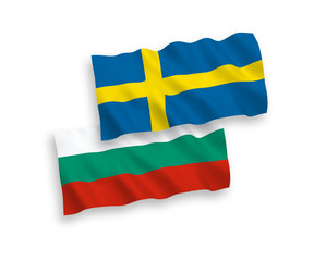National vector fabric wave flags of Bulgaria and Sweden isolated on white background. 1 to 2 proportion.