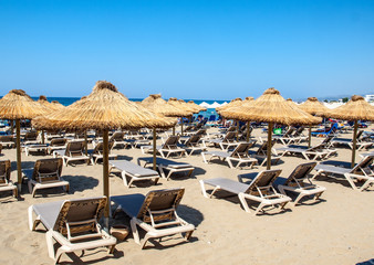 Sunbeds at the beach in Malia on Crete, Greece