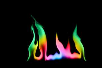 Rainbow fire and flame on black background.