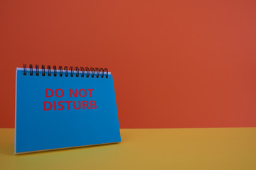  Colorful background with a notebook on top of a table and a notebook. Contemporary and youth design.