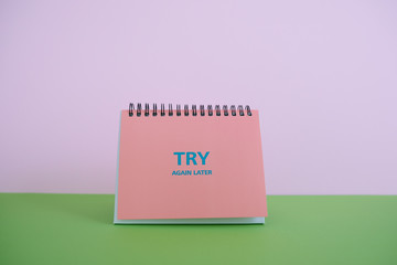  Colorful background with a notebook on top of a table and a notebook. Contemporary and youth design.