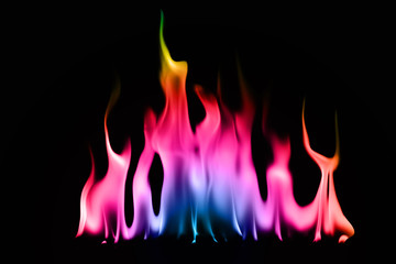 Rainbow fire and flame on black background.