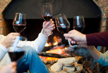 Friends celebrate their birthday at the local winery. Elegant glasses with homemade quality wine