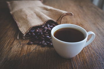 espresso and coffee beans on a table