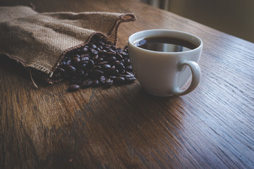 espresso and coffee beans on a table