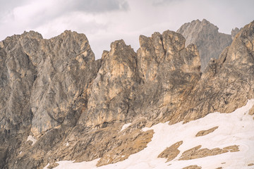 Scenery Alps with white snow on rocky mountain