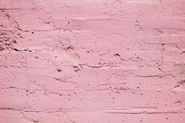pink textured wall, dried paint strokes on the wall