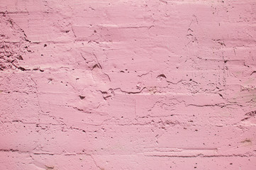 pink textured wall, dried paint strokes on the wall