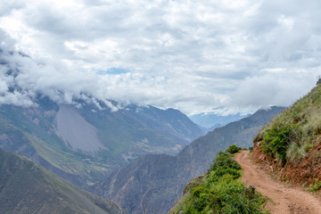 Hiking path at high altitude Peruvian mountains, the Choquequirao trek to Machu Picchu, alternative to Inca Trail, Peru