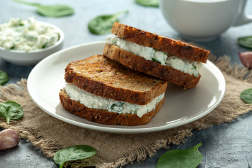 Ricotta cheese spinach sandwich with coffee. healthy breakfast