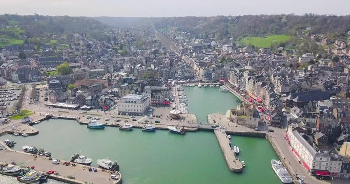 Panoramic drone video of Honfleur city center and its marina in Normandy France
