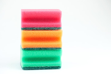 three sponges for washing dishes on white background