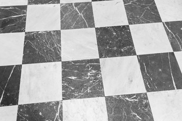 Black and white checkered marble floor. Marble texture for background