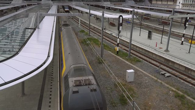 Double Decker Train arrives at the new Utrecht Central train station at the end of the day, Utrecht, The Netherlands, July 12th 2019