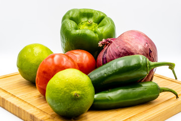Colourful ingredients for pico de gallo on boards and in bowls. Calgary, alberta, Canada