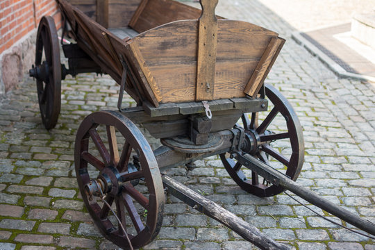 .old wooden cart on the pavement