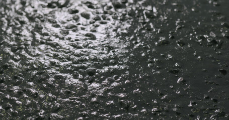 vibrating liquid concrete to remove air bubbles