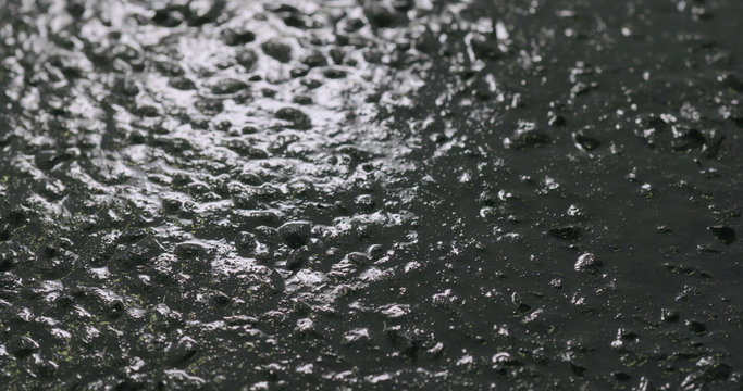 vibrating liquid concrete to remove air bubbles