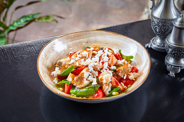 Warm seafood fish salad. Salad with pike perch, quinoa, spinach and tomato. Healthy bowl for lunch. Restaurant food concpet. dieting food concept. Grilled fish
