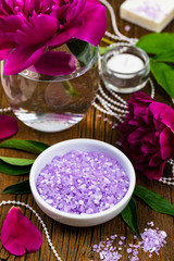 Fototapeta na wymiar Purple Peony Rose Bath Salt Blend for Spa and Aromatherapy. Selective focus.