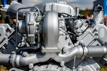 Fototapeta na wymiar Modern car engine closeup. Fragment of car engine