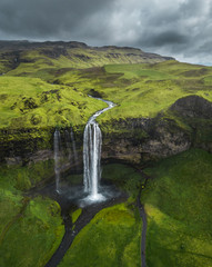 Aerial view of beautiful Seljalandsfoss waterfall in Iceland during the spring. 