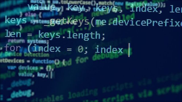 One monitor with programming code.
