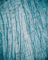 Naklejka premium Aerial view of glacier in Iceland. The tongue of Vatnajokull glacier. Beautiful ice pattern. 