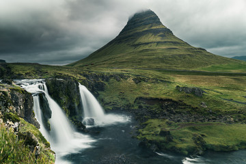 Beautiful scenery of Kirkjufell mountain and Kirkjufellfoss waterfall in Iceland. Famous landmark,in west Iceland. 